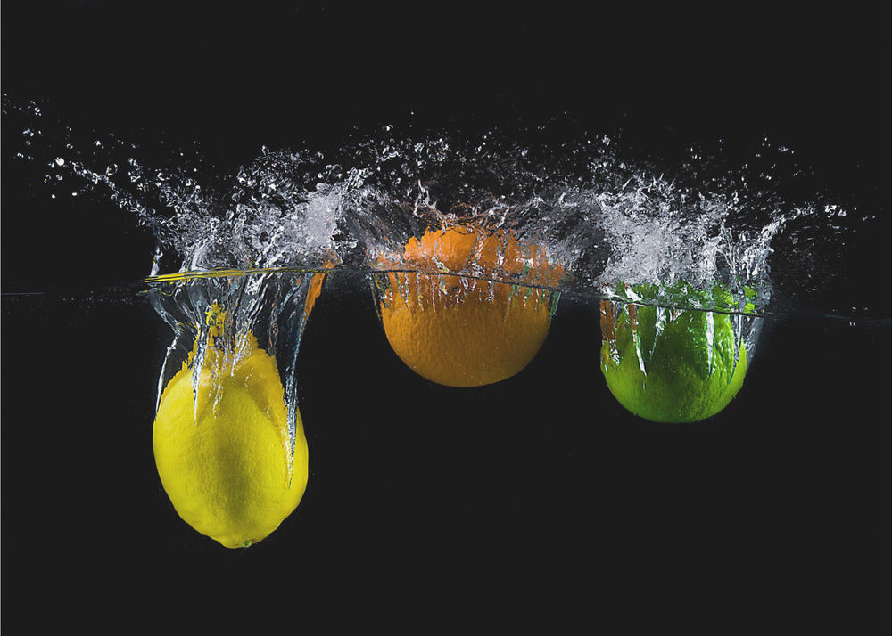 Dreifacher Zitrusspritzer | Fototapeten